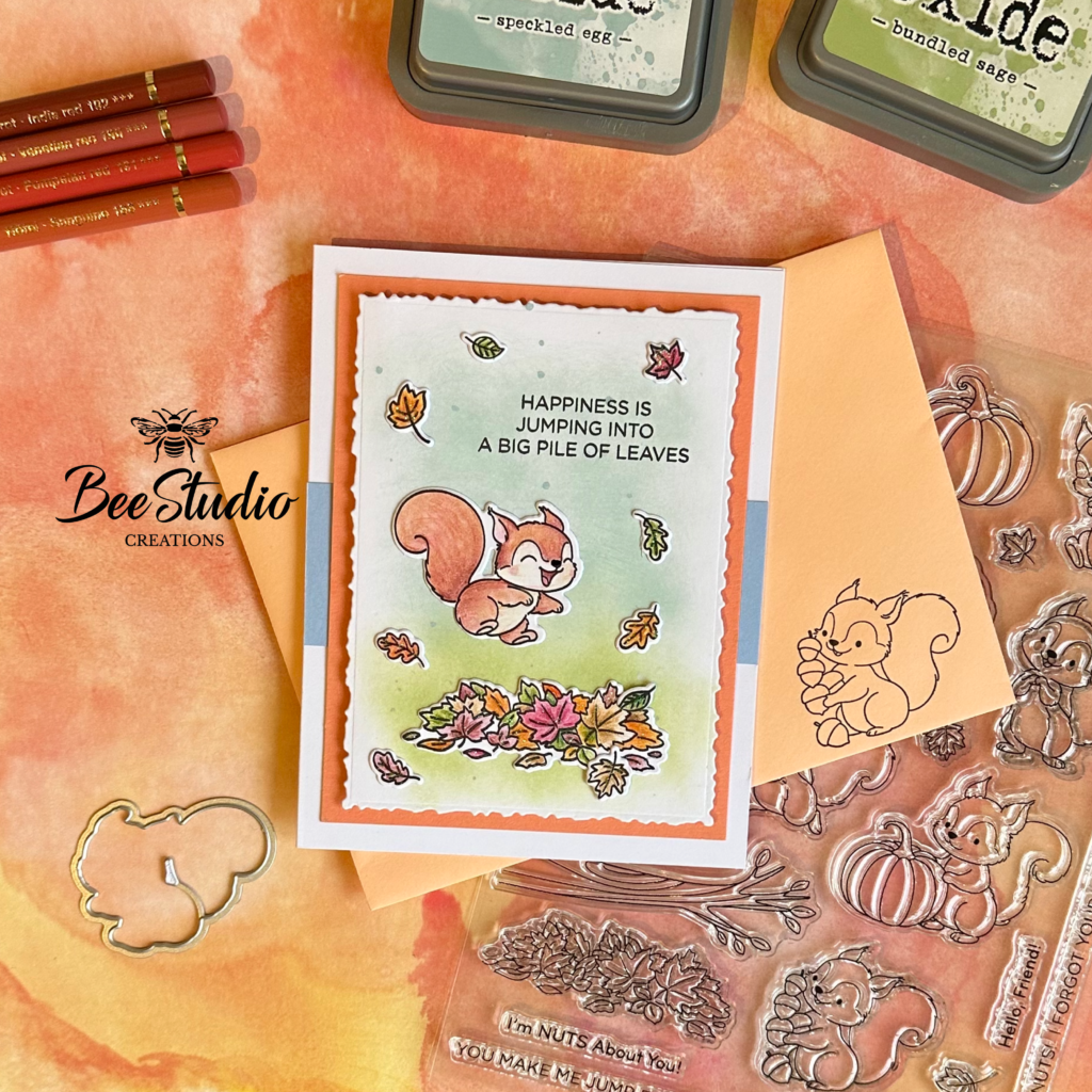 Cute squirrel birthday card with matching envelope in autumn colours.