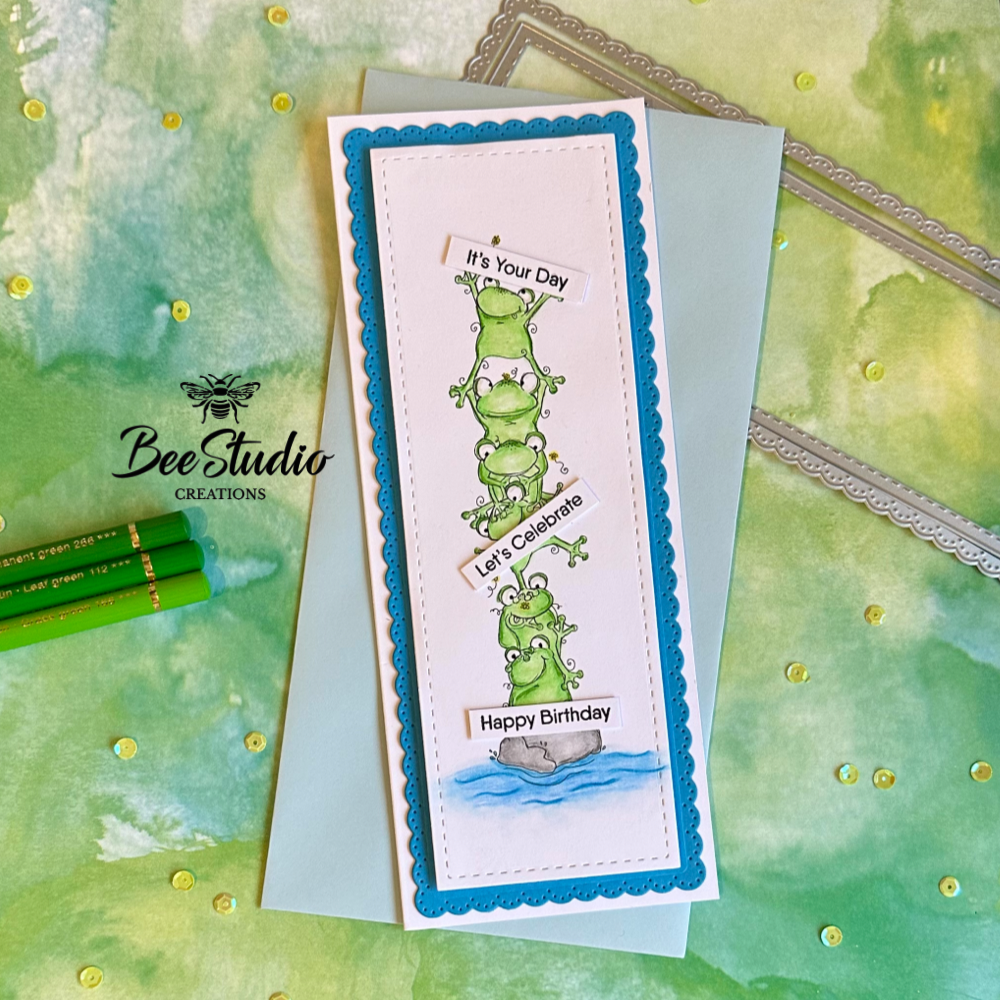 Fun stacked frogs on a slimline birthday card.